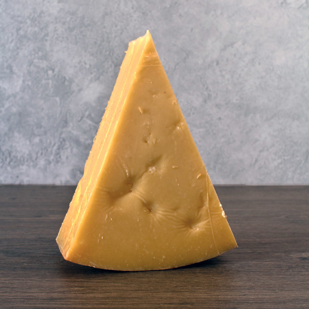 Shop | Quicke's Extra Mature Cheddar - Cheese Cuisine